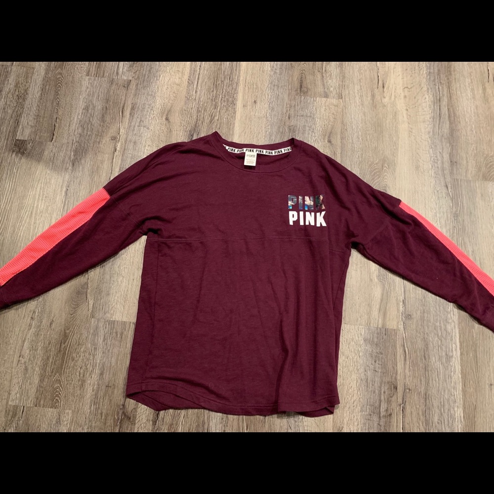 A Victoria secret sweatshirt